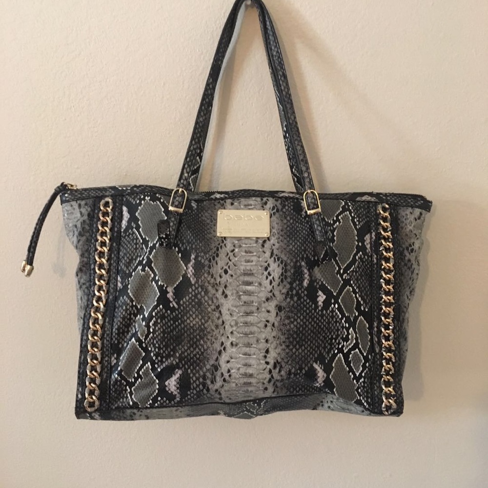 Bebe woman chic snake skin tote